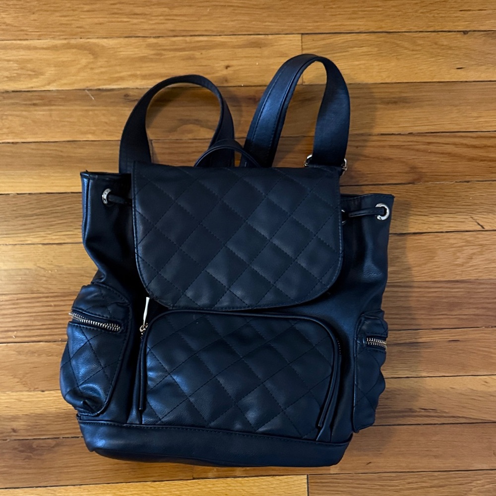 Luxe Black Quilted Backpack with Gold Hardware Details